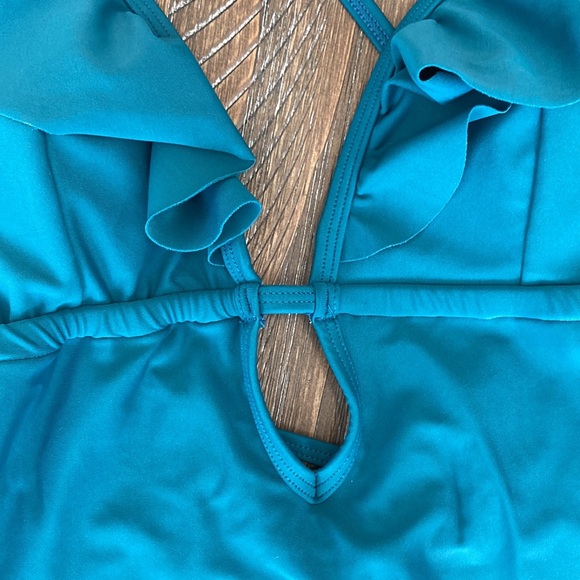 Teal strappy one piece swimsuit. - Picture 2 of 3